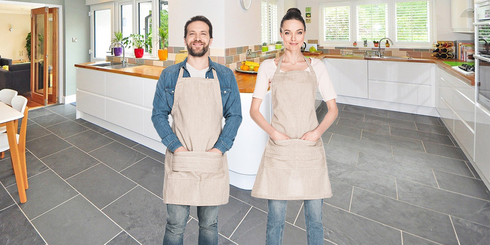 Colourful aprons in front of a blue wall